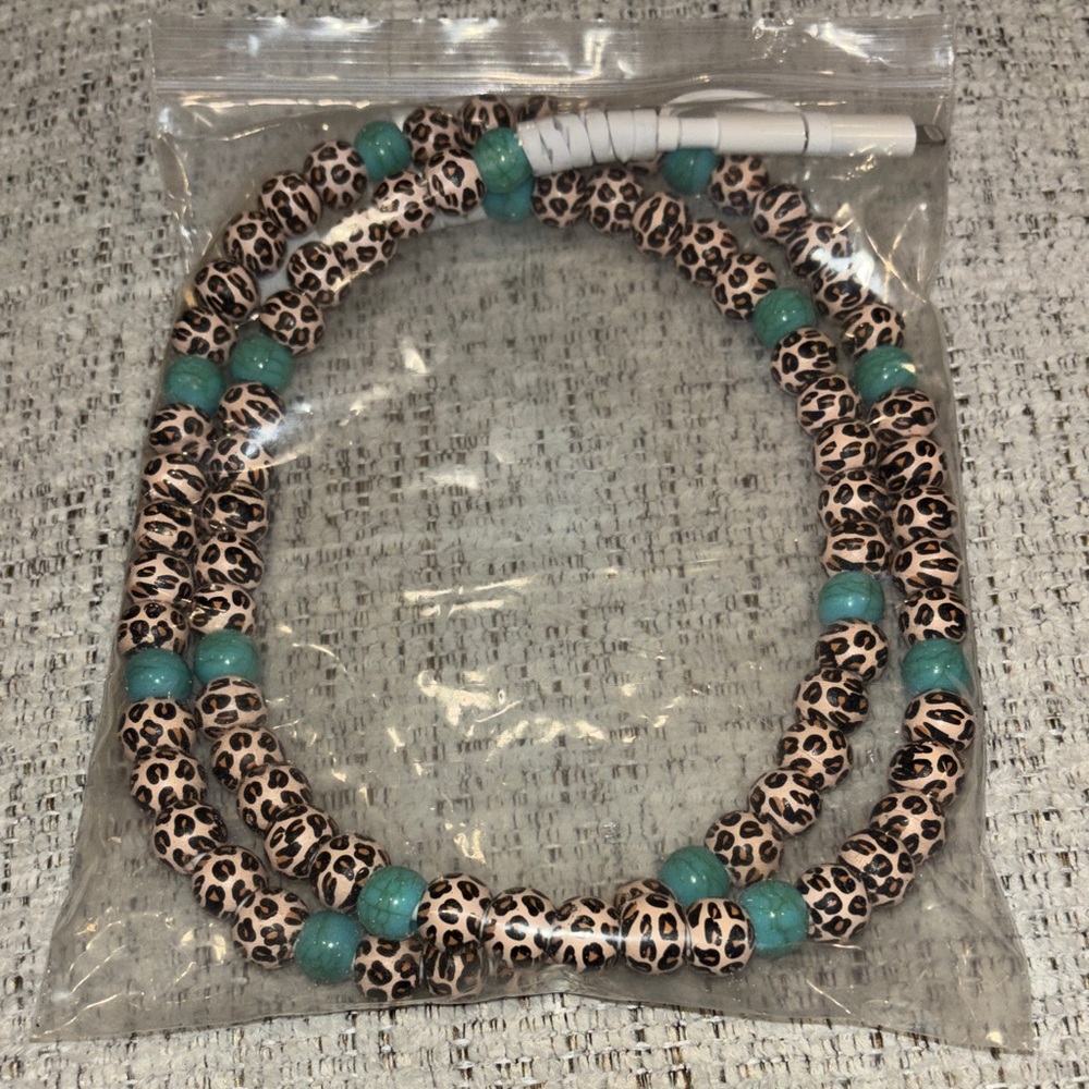 Leopard Print Beaded cell phone charger with Turquoise Accents